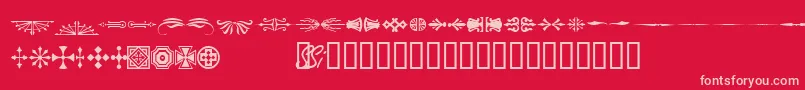 Woodcutornamentsonessk Font – Pink Fonts on Red Background