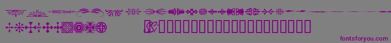 Woodcutornamentsonessk-fontti – violetit fontit harmaalla taustalla