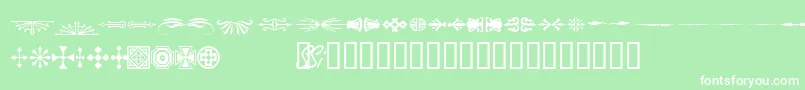 Woodcutornamentsonessk-Schriftart – Weiße Schriften auf grünem Hintergrund