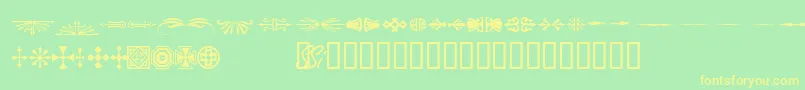 Woodcutornamentsonessk Font – Yellow Fonts on Green Background
