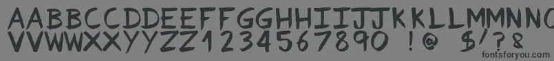 フォントFvriosa – 黒い文字の灰色の背景