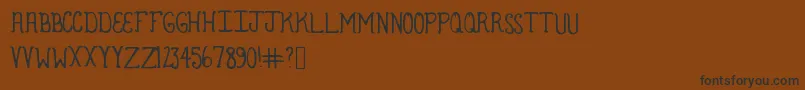 Weitere Informationen zur Armadillo-Schriftart Armadillo-Schriftart – Schwarze Schriften auf braunem Hintergrund