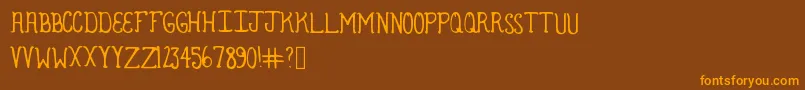 Armadillo Font – Orange Fonts on Brown Background