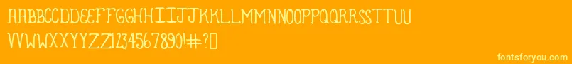 Armadillo-Schriftart – Gelbe Schriften auf orangefarbenem Hintergrund