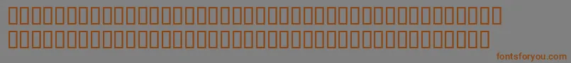 フォントHenrypatricksh – 茶色の文字が灰色の背景にあります。