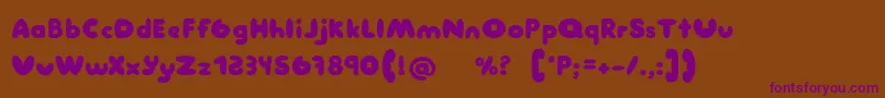 Manis Font – Purple Fonts on Brown Background