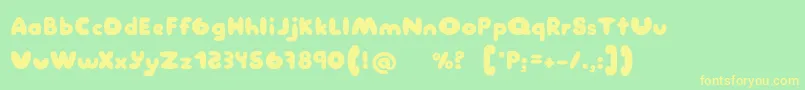 Manis Font – Yellow Fonts on Green Background