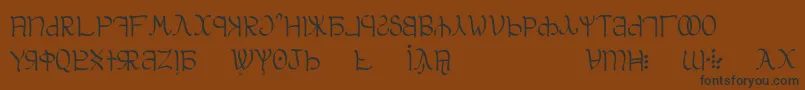 フォントAglab – 黒い文字が茶色の背景にあります