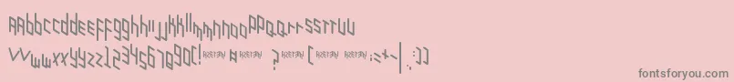 Zigzagzug-fontti – harmaat kirjasimet vaaleanpunaisella taustalla