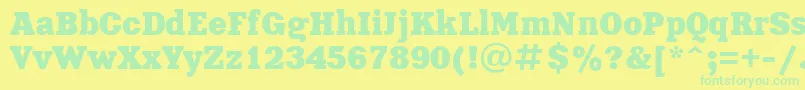 Xna85C Font – Green Fonts on Yellow Background