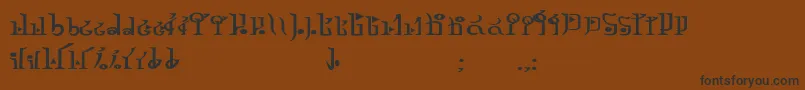 TphylianGcnbold Font – Black Fonts on Brown Background