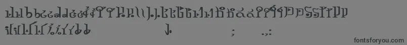 フォントTphylianGcnbold – 黒い文字の灰色の背景