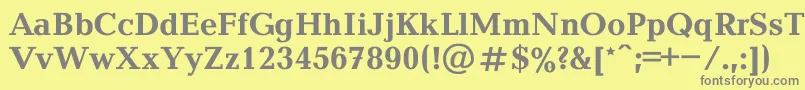 BalticaBold-fontti – harmaat kirjasimet keltaisella taustalla