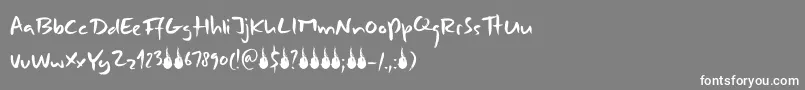 フォントDkCombustible – 灰色の背景に白い文字