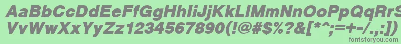CyrveticaExtraBoldOblique-fontti – harmaat kirjasimet vihreällä taustalla