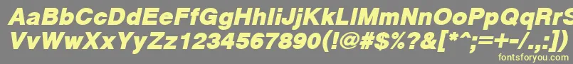 CyrveticaExtraBoldOblique-fontti – keltaiset fontit harmaalla taustalla