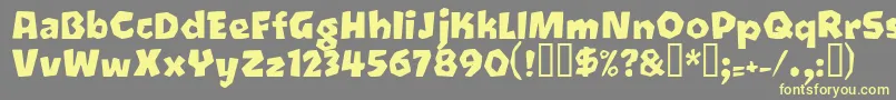 Oetztyp Font – Yellow Fonts on Gray Background