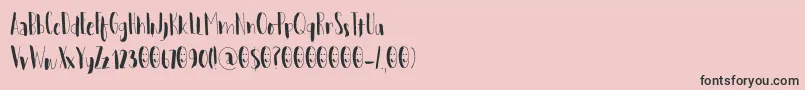 Fonte WoebegoneDemo – fontes pretas em um fundo rosa