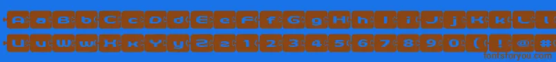 D3Pazzlisma-Schriftart – Braune Schriften auf blauem Hintergrund