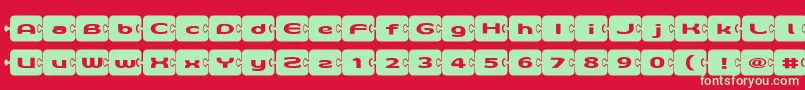 D3Pazzlisma-Schriftart – Grüne Schriften auf rotem Hintergrund