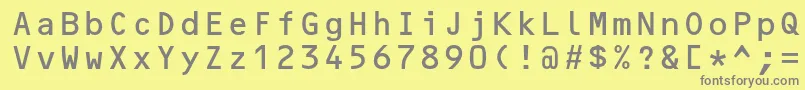 フォントOcrbstd – 黄色の背景に灰色の文字