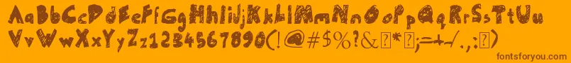 UnFinished-Schriftart – Braune Schriften auf orangefarbenem Hintergrund