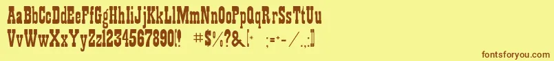 フォントRsplaybill – 茶色の文字が黄色の背景にあります。