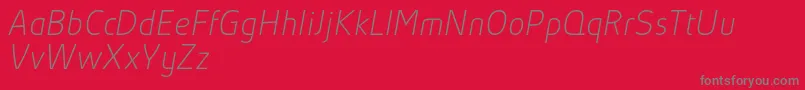 AbsolutProThinItalicReduced Font – Gray Fonts on Red Background