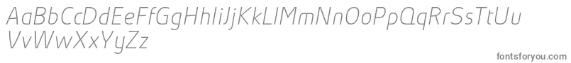AbsolutProThinItalicReduced-fontti – harmaat kirjasimet valkoisella taustalla