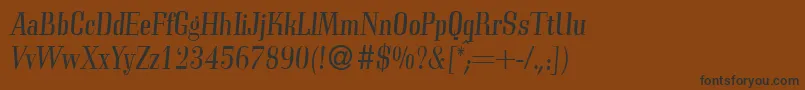 C794RomanItalic-Schriftart – Schwarze Schriften auf braunem Hintergrund