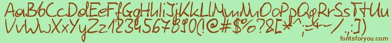 Шрифт Tomaszskowronski – коричневые шрифты на зелёном фоне
