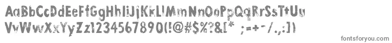 LinoStampBold-fontti – harmaat kirjasimet valkoisella taustalla