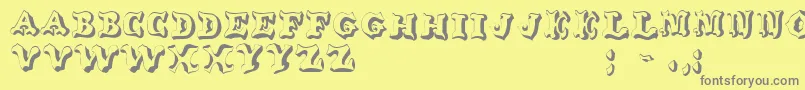 OxnardRegular-fontti – harmaat kirjasimet keltaisella taustalla