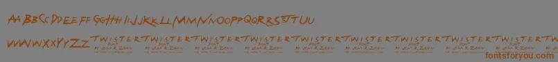 フォントTwisterFont – 茶色の文字が灰色の背景にあります。