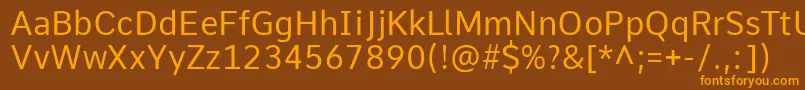 CommeRegular1 Font – Orange Fonts on Brown Background