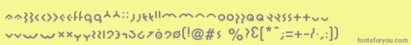 フォントOmikron – 黄色の背景に灰色の文字