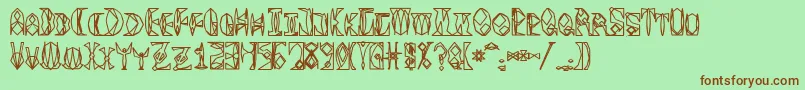 Więcej informacji o czcionce Space Gimboid Czcionka Space Gimboid – brązowe czcionki na zielonym tle