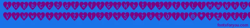 DjbShapeUpHearts Font – Purple Fonts on Blue Background