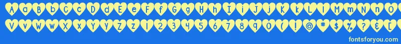 DjbShapeUpHearts Font – Yellow Fonts on Blue Background