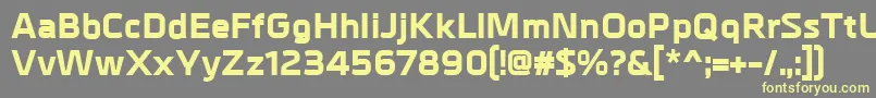 MetrikExtrabold-fontti – keltaiset fontit harmaalla taustalla