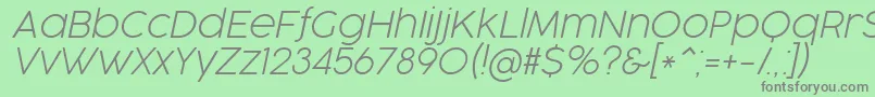 フォントCocogooseProUltralightItalicTrial – 緑の背景に灰色の文字