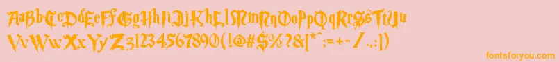 フォントMagic School Two – オレンジの文字がピンクの背景にあります。