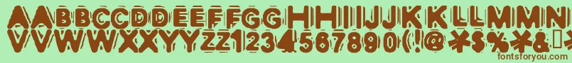 Discobox Font – Brown Fonts on Green Background