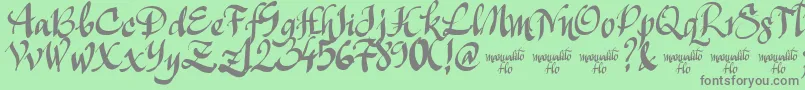 Czcionka ManualitoFlo – szare czcionki na zielonym tle