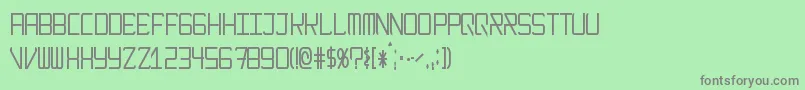 ModernismNarrow-fontti – harmaat kirjasimet vihreällä taustalla