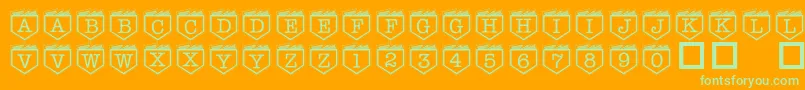 101InMyPocket-fontti – vihreät fontit oranssilla taustalla