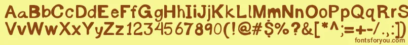 フォントByronreccon – 茶色の文字が黄色の背景にあります。