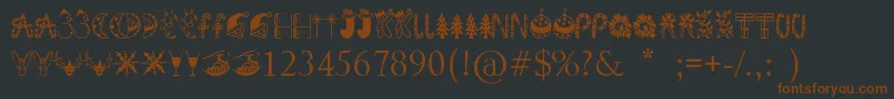 Шрифт KringleyChristmas – коричневые шрифты на чёрном фоне