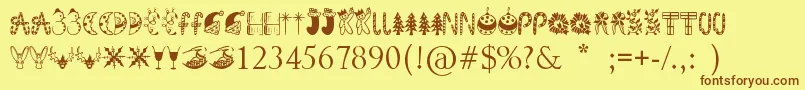 フォントKringleyChristmas – 茶色の文字が黄色の背景にあります。