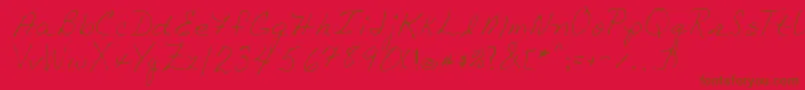 フォントLindaRegular – 赤い背景に茶色の文字